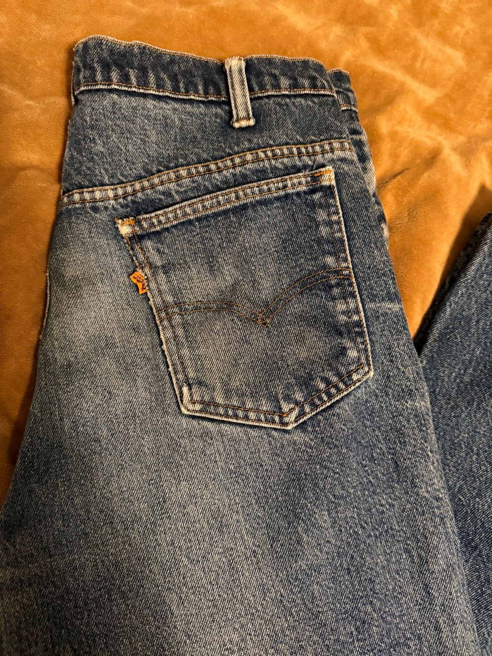Levi's vintage orange tag.  Medium Blue Straight-Leg Denim Jeans